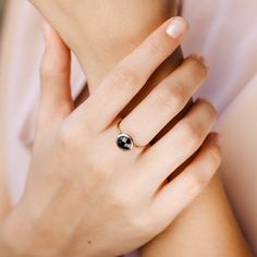 Black onyx 14K gold ring. A dainty, delicate black onyx gemstone ring, ideal for stacking for every woman who loves elegance. An excellent choice for anniversary gift or birthday gift for her. 100% handcrafted with love!D E T A I L S● Metal: 14K solid gold, 14K white gold or 14K rose gold● Gemstone: Black Onyx, briolette cut● Stone Diameter: 8mm (0.31in), 10mm (0.4in) and 12mm (0.5in) R I N G ∙ S I Z I N GFor General Reference:● we use standard US Ring Sizing● an average women's ring finger is s Black Bezel Set Jewelry For Anniversary, Black Birthstone Ring Gift, Black Birthstone Rings For Anniversary, Black Round Band Fine Jewelry, Elegant Onyx Rings For Everyday Wear, Round Black Enamel Diamond Ring For Anniversary, White Gold Round Jewelry With Black Enamel, Black 14k Gold Open Signet Ring, Black Birthstone Jewelry For Promise Ring