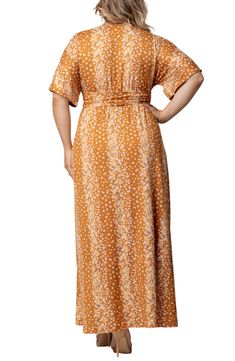 A romantic look is made easy with this knit maxi dress in a flattering Empire-waist design with fluttery dolman sleeves and a fanciful floral print. 60" length (size 2X) Slips on over head Surplice V-neck Short flutter sleeves Side slit Unlined 95% polyester, 5% spandex Machine wash, dry flat Made in the USA of imported fabric Dresses Stencil Print, Knit Maxi Dress, Romantic Look, Maxi Knit Dress, Flutter Sleeves, Nordstrom Dresses, Dolman Sleeve, Empire Waist, Dress Fabric