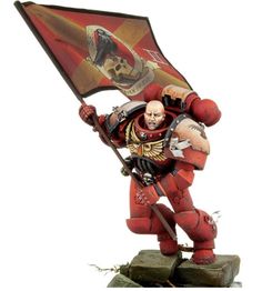 a red and black warhammer holding a flag