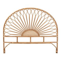 the headboard is made out of bamboo and has an intricate design on it's sides