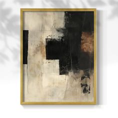 a black and white painting hanging on the wall