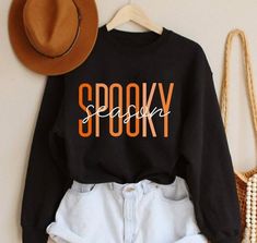 Spooky Season Sweatshirt Fall Sweatshirt Halloween Shirt Fall Shirt Halloween Hoodie Ghost Boo Halloween Sweatshirt Fall Sweater Easy 30 day return policy. halloween sweatshirt ideas halloween sweatshirt outfit halloween sweatshirt embroidery #halloweensweatshirtideas #halloweensweatshirtoutfit #halloweensweatshirtembroidery Fall Cricut Projects, Halloween Shirt Design, Halloween Tee Shirts, Halloween Apparel, Pinterest Ideas, Party Inspo, Halloween Sweater, Halloween Hoodie