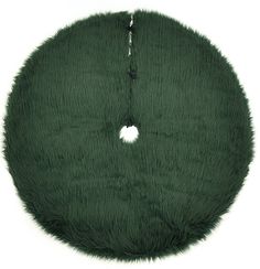 a green round rug on a white background