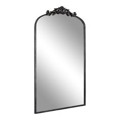 an ornate mirror is shown against a white background