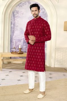 Reddish maroon full sleeves kurta crafted in silk with all over crescent bloom chikankari embroidery and sequin highlights. Paired with a pant. - Aza Fashions Red Traditional Wear With Naqshi For Diwali, Red Straight Kurta With Naqshi, Red Sherwani With Chikankari Embroidery For Puja, Traditional Long Sleeve Wear With Naqshi For Festivals, Red Chikankari Embroidery Sherwani For Puja, Long Sleeve Traditional Wear With Naqshi For Festivals, Red Sherwani With Chikankari Embroidery Long Sleeve, Red Sherwani With Chikankari Embroidery For Diwali, Red Chikankari Sherwani For Diwali