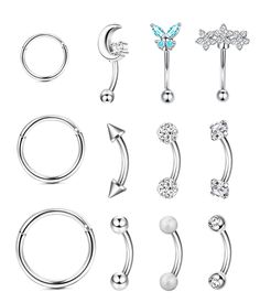 PRICES MAY VARY. 1. [Packing set]: Order comes with 12pcs 16G rook daith earrings and curved eyebrow rings, cartilage hoop piercing in different styles, affordable price, more choices for every day wearring. 2.[Popular Gauge]: 16G /1.2mm bar thickness, 8mm bar length and 3mm ball size, earrings hoop , inner diameter , 15/64"(6mm),5/16"(8mm), 3/8"(10mm); perfect fit for body piercing. 3. [Quality Material]: The 16G cartilage earrings and 16G curved barbells are made with 316L surgical stainless s Eyebrow Piercing Jewelry, Eyebrow Rings, Piercing Cartilage, Eyebrow Piercing, Lip Ring, Body Piercings, Tragus, Helix, Piercing Jewelry