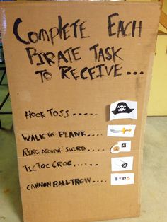 a cardboard sign that says complete each pirate task to receive