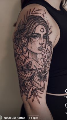 a woman's arm with a tattoo on it and flowers around her neck,