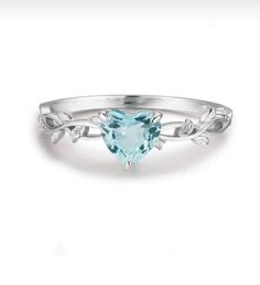 This elegant silver ring features a light blue heart-shaped figure, adding a touch of romance to your style. The soft curves of the heart and the soothing tone of light blue make this ring a perfect accessory for both everyday wear and special occasions. Handmade with high-quality craftsmanship, this ring is a thoughtful gift option for a loved one. Its lightweight and chic design ensures comfortable wear throughout the day. Romantic Jewelry, Romantic Jewellery, Silver Lights, Starling, Silver Rings Handmade, Blue Heart, Ring Handmade, Chic Design, Handmade Ring