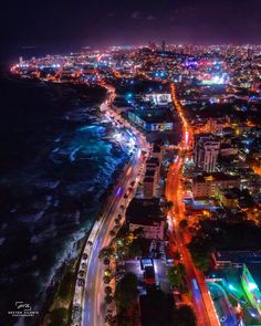 an aerial view of a city at night