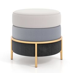 three round stools stacked on top of each other, one in grey and the other in white