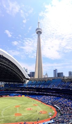 a baseball stadium filled with lots of people