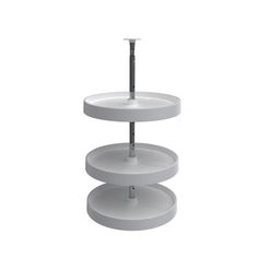 a three tiered white cake stand on a white background