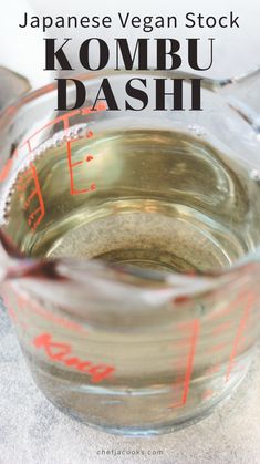 a glass measuring cup filled with kombu dash and the words japanese vegan stock