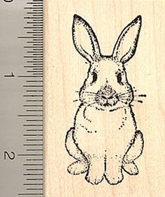 a rubber stamp with a rabbit on it