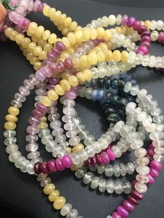 the beads are all different colors and sizes