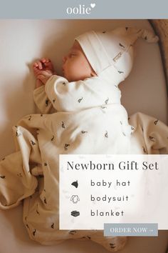 newborn gift set baby hat, bodysuit and blanket in white with black birds on it