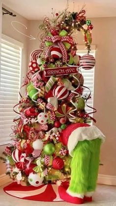 a christmas tree decorated with red and green ornaments