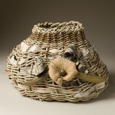 a basket that has some kind of flower in it