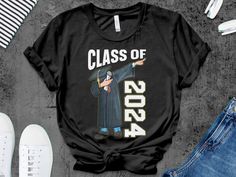 Class of 2024 graduation gifts idea for boys men     Unisex Gildan T-shirt * 100% ring-spun cotton * Sport grey is 90% ring-spun cotton, 10% polyester * Dark heather is 65% polyester, 35% cotton * 4.5 oz/y² (153 g/m²) * Pre-shrunk * Shoulder-to-shoulder taping * Quarter-turned to avoid crease down the center     Unisex Bella Canva Shirt * 100% combed and ring-spun cotton (heather colors contain polyester) * Fabric weight: 4.2 oz (142 g/m2) * Pre-shrunk fabric * Shoulder-to-shoulder taping * Side-seamed     Unisex Bella Canva Tank top * 100% combed and ringspun cotton * Tri-blends are 50% polyester/25% combed/25% ringspun cotton/rayon * Side-seamed, unisex sizing * Sizes - XS-2XL     Women Shirt Next Level 3900 100% combed ringspun cotton (fiber content may vary for different colors) Light Pre-shrunk Cotton T-shirt For Graduation Party, Black Pre-shrunk T-shirt For Graduation Gift, School Spirit Cotton T-shirt For Graduation, School Spirit Cotton T-shirt For Graduation Gift, Cotton Graduation T-shirt, Black Short Sleeve T-shirt For Graduation Gift, Cotton T-shirt For Graduation Party, Cotton Short Sleeve T-shirt For Graduation Party, Cotton T-shirt For Graduation