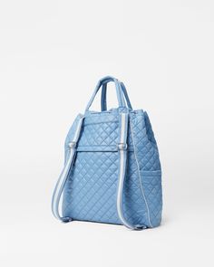 Our new tennis bag features the same versatile shape as our Metro Convertible Backpack, with a tennis sleeve that can fit up to two racquets. Doubles Tennis, Tennis Bag, Mz Wallace, Quilted Backpack, Racquets, Convertible Backpack, Blue Interior, Cornflower Blue, Luxury Women