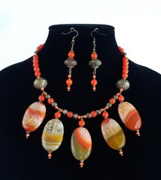 This Jewelry Sets item is sold by RainbowTimeMachine. Ships from United States. Listed on Mar 21, 2024 Handmade Orange Jewelry With Oval Beads, Bohemian Czech Glass Jewelry With Oval Beads, Handmade Czech Glass Jewelry With Oval Beads, Orange Oval Beads Jewelry For Gift, Artisan Jewelry With Faceted Beads And Dangle Design, Artisan Jewelry With Faceted Beads Dangle, Artisan Jewelry With Faceted Bead Dangles, Artisan Dangle Jewelry With Faceted Beads, Orange Faceted Beads For Jewelry Making