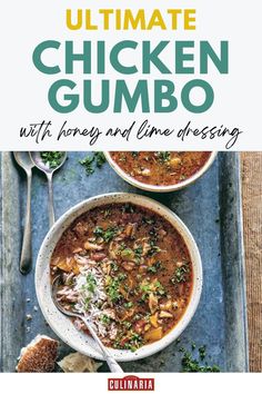 A hearty bowl of gumbo topped with rice, parsley, and served with crusty bread.