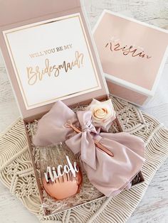 the bridesmaid gift box is open and ready to be delivered