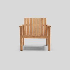 a wooden chair on a gray background