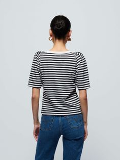 We elevated your everyday tee with delicate feminine details. (It's the easy envelope neckline and chic pleats on the shoulders.) Same boxy short sleeves and relaxed fit you love, but now polished enough to wear to work. (This one comes in black and white City Stripe.) | Women's Deana Tee Top in City Stripe | Ethical Essentials Easy Envelope, Denim Sweater Jacket, Black And White City, Delicate Feminine, Romper And Jacket, Loungewear Luxury, Denim Sweater, Jumpsuit Jacket, Wear To Work