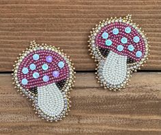 pair of pink and white beaded mushroom earrings