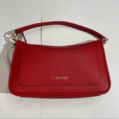 New With Tags Calvin Klein Bag Color- Pop Poppy, Red Top Handle Bag For Spring, Spring Red Top Handle Bag, Elegant Calvin Klein Evening Shoulder Bag, Calvin Klein Bag With Gold-tone Hardware For Shopping, Calvin Klein Shoulder Bag With Gold-tone Hardware For Shopping, Calvin Klein Shoulder Bag For Shopping, Red Bag With Removable Pouch For Spring, Elegant Red Bags For Spring, Calvin Klein Shopping Bag With Branded Hardware