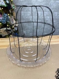 a wire basket sitting on top of a table