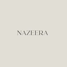 the word nazera written in black ink on a gray background with an image of a