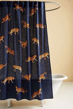 a shower curtain with leopards on it