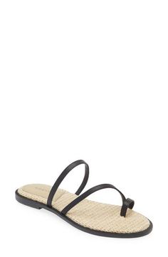 A woven raffia footbed and slender toe loop emphasize the beachy vibe of an easy-wear slide sandal made for sunny days. Synthetic upper/leather lining/synthetic sole Imported Hispanic & Latinx Owned/Founded Beach Footbed Sandals With Toe Post, Synthetic Single Toe Strap Vacation Footbed Sandals, Synthetic Footbed Sandals With Single Toe Strap For Vacation, Synthetic Single Toe Strap Footbed Sandals For Vacation, Synthetic Toe Post Footbed Sandals For Beach, Spring Beach Footbed Sandals With Single Toe Strap, Summer Beach Toe Ring Sandals With Removable Insole, Summer Vacation Toe Loop Footbed Sandals, Synthetic Toe Loop Footbed Sandals For Beach