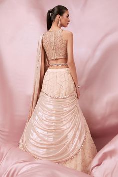 Rose gold lehenga saree featuring hand embroidery with sequins. Paired with a padded blouse and a belt, it includes an attached cancan for added volume., Fit: Relaxed Rose Gold Lehenga, Rose Pink Lehenga, V Neck Lehenga, Gorgeous Lehenga, Lehenga Sari, Embroidery With Sequins, Gold Lehenga, Hand Embroidered Blouse, Padded Blouse