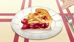 a piece of pie sitting on top of a white plate next to a fork and knife