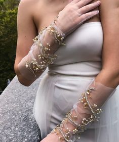 Kerry Parker Store's Crystal Gardenia Gloves Shop All Gloves : https://www.etsy.com/in-en/shop/KerryParkerStore?ref=seller-platform-mcnav&section_id=24436461 A garden of Swarovski, pearls and pretty fantasies! Here's a pair of gloves that combines the sensuality of Swarovski, poise of pearls and charm of crystals. A vine of these beautiful embellishments, strung together to give a royal touch to a pair of ivory silk tulle gloves. Just the perfect pair for the modern day bride! Imagine walkin Elegant Fingerless Bridal Accessories For Wedding, Elegant Fingerless Bridal Accessories For Party, Tulle Gloves, Gloves Vintage, Formal Gloves, Wedding Gloves, Bridal Gloves, Silk Tulle, Ivory Silk