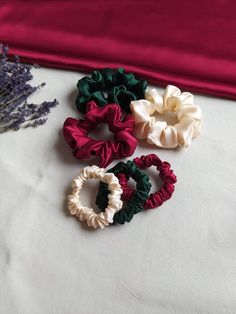 Silk satin scrunchies in green, champagne and red colours. Purple Scrunchie, Dark Green Hair, Red Champagne, Floral Logo Design, Beautiful Hairstyle