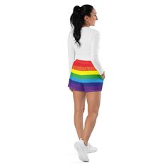 Add these cute striped rainbow shorts to your festival wardrobe. Not only super cool for pride events, they are also functional athletic shorts suitable for swimming, spending time on the beach or by the pool, gym workouts or outdoor leisure activities. You'll also appreciate the mesh pockets large enough to hold your phone. DETAILSComfortable elastic waistband with a flat white drawstringDeep mesh side-pocketsWater-repellent microfiber fabricMoisture wickingBreathable & fast dryingUPF50+ protectionMATERIAL91% recycled polyester, 9% spandex (composition may vary by up to 3%)Model wears size MHeight 5.5 feet (165 cm), waist circumference 29.1" (74 cm), hips 36.6" (93 cm) Rainbow Shorts, Pride Event, Cute Rainbow, Beach Swimming, Flat White, Outdoor Leisure, Rainbow Flag, Leisure Activities, Water Repellent Fabric