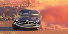 the cars are driving down the road in disney's cars movie, which is about to be released on dvd