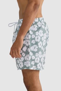 The Apollo Sage Swim Shorts are the perfect addition to your summer wardrobe. Made from 100% Recycled Polyester, these mid-length shorts are quick-drying and lightweight. An elastic waistband with drawstring provides an adjustable fit, while internal fine mesh briefs provide extra comfort. Quick drying, mid-length swim shorts 100% Recycled Polyester Internal fine mesh briefs Elastic waistband with drawstring Two side pockets with rear button up pocket Designed in Australia. Made in China Mid Length Shorts, Mens Swim Shorts, Recycled Yarn, Man Swimming, Swim Shorts, Slow Fashion, Summer Wardrobe, Mid Length, Briefs