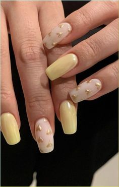 #YellowNails #YellowNailArt #YellowManicure #NailGoals #NailInspo #NailDesigns Yellow Nails With Heart, Yellow And Gray Nails Design, Yellow Wedding Nails For Bride, Light Yellow Nail Designs, Yellow Bow Nails, Yellow Valentine Nails, Yellow Quinceanera Nails, White And Yellow Nails Ideas, Yellow Prom Nails Acrylic