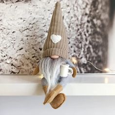 PRICES MAY VARY. Adorable Coffee Gnome Dolls - These cute coffee gnome dolls will please you with their kindness and charm. They want a place on your table, desk, fireplace, bookshelf, tiered tray, and more, creating a festive and welcoming home environment. Handmade and High-Quality Material - These handmade gnome figures are made of plush fabric and felt, soft, non-toxic, and neatly sewn. The coffee cups in their hands are made of felt cloth. The perfect gift - Scandinavian gnomes bring joy an Coffee Gnomes, Valentines Coffee, Swedish Tomte, Swedish Decor, Traditional Christmas Decorations, Gnomes Diy, Doll Home, Led Christmas Lights, Christmas Gnomes