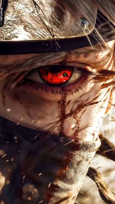 a close up of an evil looking person's face with blood on his eyes