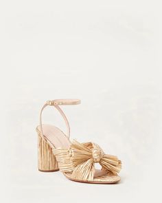 Camellia Bow Heel in Gold | Over The Moon Bow Heels, Beautiful Gift Wrapping, Ivory Pearl, Heeled Sandal, Loeffler Randall, Gold Heels, Leather Pieces, Pearl Color, Ankle Strap Heels