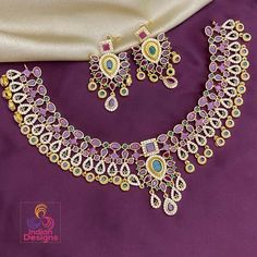 Elegant and exclusive South Indian style matte finish gold necklace studded with Ruby emerald and clear stones.  Please note that its matte gold tone! Stone Necklace Designs, Kemp Necklace, South Indian Style, Choker Necklace Designs, Ruby Emerald, Gold Choker Necklace, Kundan Necklaces, Cz Jewelry, Gold Choker