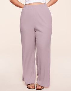 The coziest, most cuddly lounge pants you've ever worn! These wide leg pants are made of a plush rib knit in a beautiful purple hue. They have an elastic waistband and inset side pockets, and they'll quickly become your go-to pants for lazy Sundays (available in 1X-4X). Wide Leg Ribbed Loungewear Pants, Relaxed Fit Wide Leg Pants With Soft Texture, Solid Color Ribbed Wide Leg Pants, Solid Color Soft Texture Wide Leg Pants, Lavender Relaxed Fit Bottoms For Loungewear, Ribbed Lounging Pants, Solid Ribbed Lounging Pants, Wide Leg Ribbed Pants For Lounging, Solid Color Ribbed Pants For Lounging