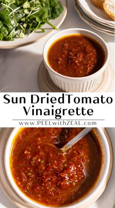 two bowls of sun dried tomato vinaigrette on a table with bread and salad